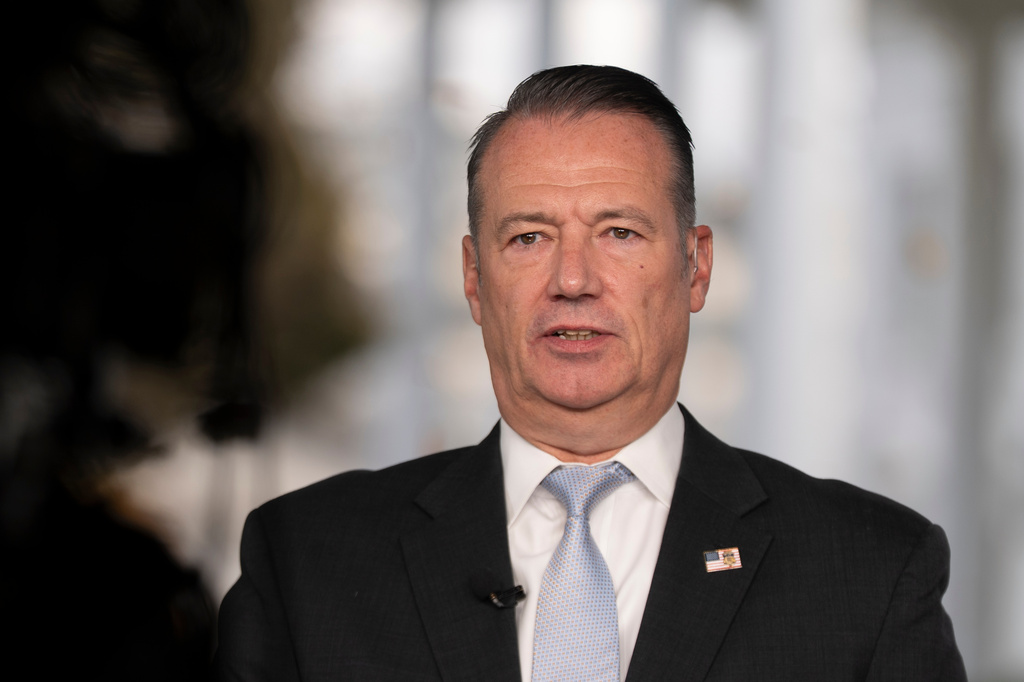 FILE - Todd Lyons, acting director of the U.S. Immigration and Customs. Enforcement (ICE), speaks during a television interview the White House Nov. 3, 2025 in Washington. (AP Photo/Manuel Balce Ceneta, File)