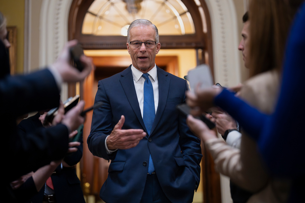 Senate Majority Leader John Thune, R-S.D., speaks to reporters outside the chamber after passing a measure by unanimous consent that would fund most of the Department of Homeland Security, if the House agrees, at the Capitol in Washington, Thursday, April 2, 2026. (AP Photo/J. Scott Applewhite)