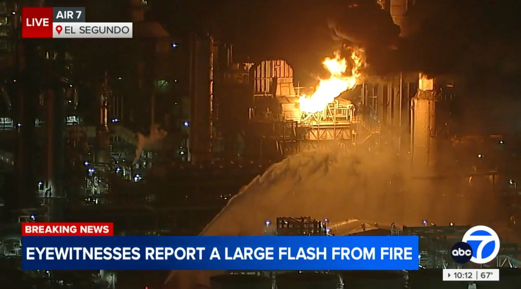 This image taken from video by ABC7 shows flames rising from the Chevron refinery in El Segundo, Calif., Thursday, Oct. 2, 2025. (ABC7 via AP)