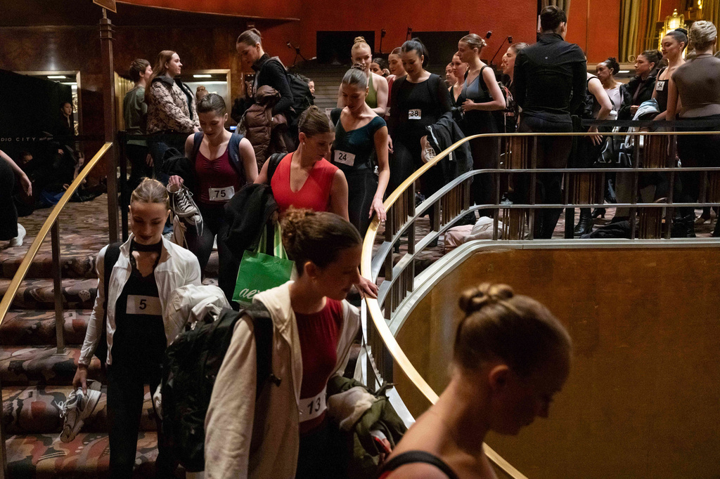 Dancers arrive at an audition for the Radio City Rockettes at Radio City Music Hall in New York, on Wednesday, April 22, 2026. (AP Photo/Yuki Iwamura)