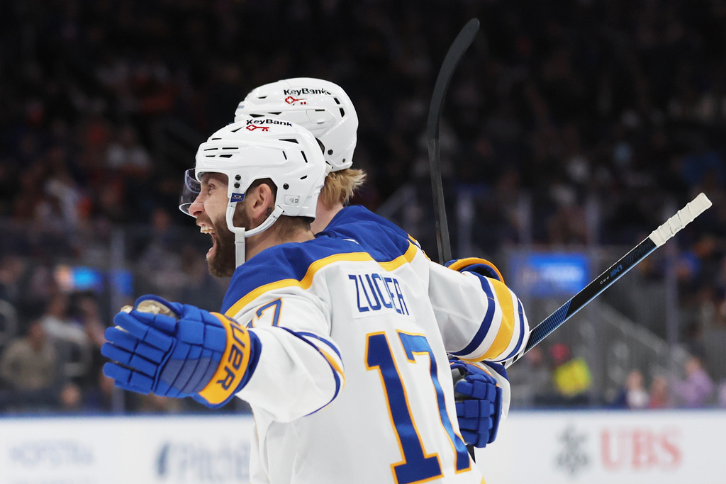 Buffalo Sabres left wing Jason Zucker (17) celebrates his goal during the third period of an NHL hockey game against the New York Islanders, Saturday, Jan. 24, 2026, in Elmont, N.Y. (AP Photo/Heather Khalifa)