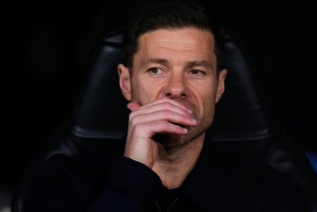 Real Madrid's head coach Xabi Alonso sits at the bench before a Champions League opening phase soccer match between Real Madrid and Manchester City, in Madrid, Spain, Wednesday, Dec. 10, 2025. (AP Photo/Manu Fernandez)