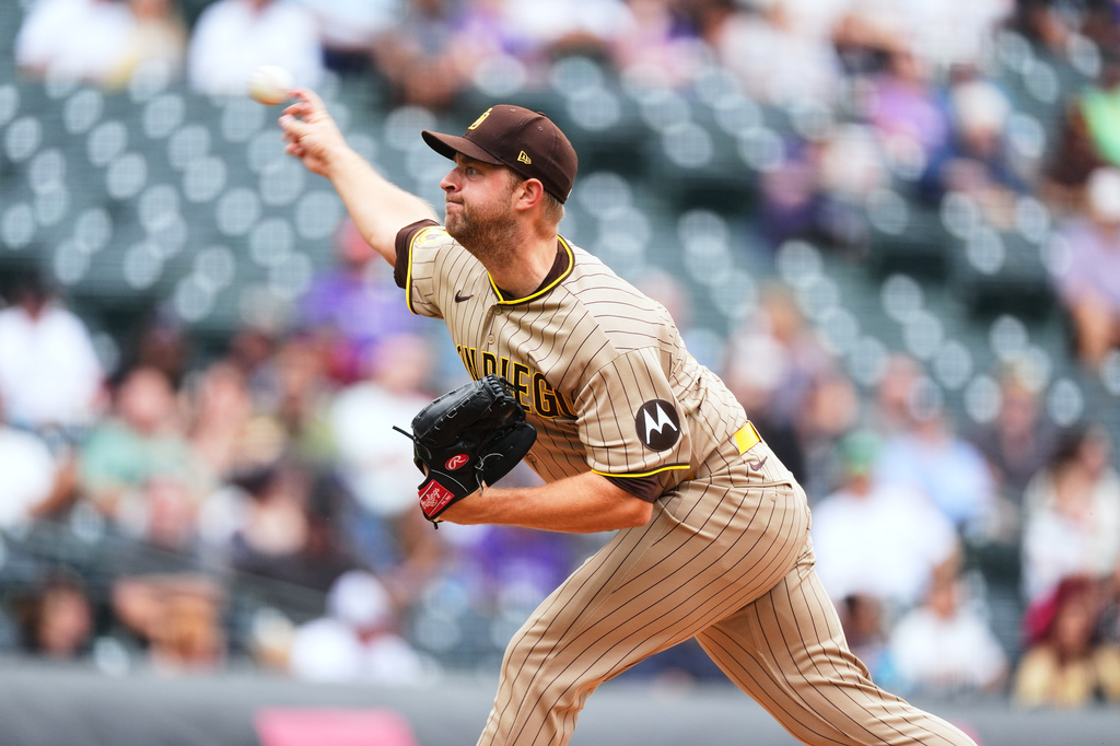 San Diego Padres starting pitcher Michael King works against the Colorado Rockies in the first inning of a baseball game, Thursday, Sept. 17, 2026, in Denver. (AP Photo/David Zalubowski)