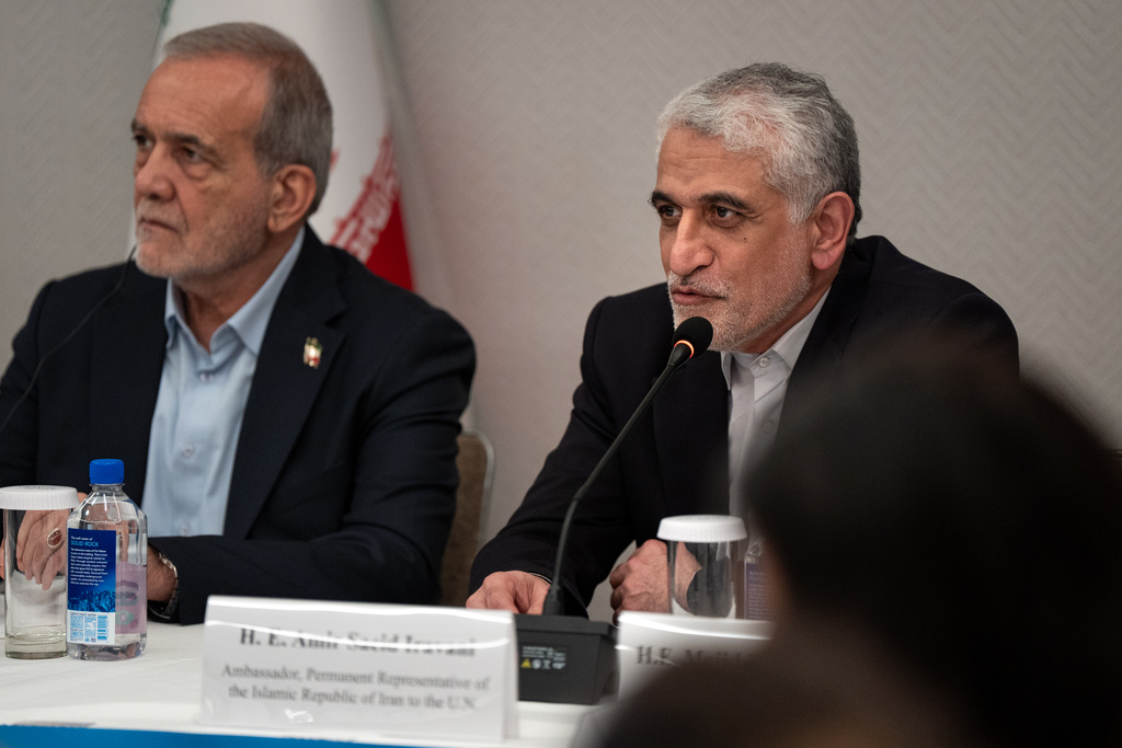 Amir-Saeid Iravani, the Iranian ambassador to the United Nations, starts a press briefing with Masoud Pezeshkian, the President of Iran, in New York, Friday, Sept. 26, 2025. (AP Photo/Angelina Katsanis)