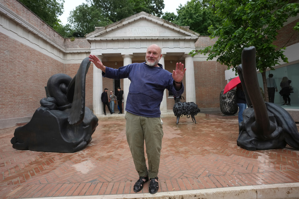 Artist Alma Allen poses outside the United States pavilion 'Call Me the Breeze' at the Venice 2026 Biennale Art, in Venice, Italy, Tuesday, May 5, 2026. (AP Photo/Luca Bruno)