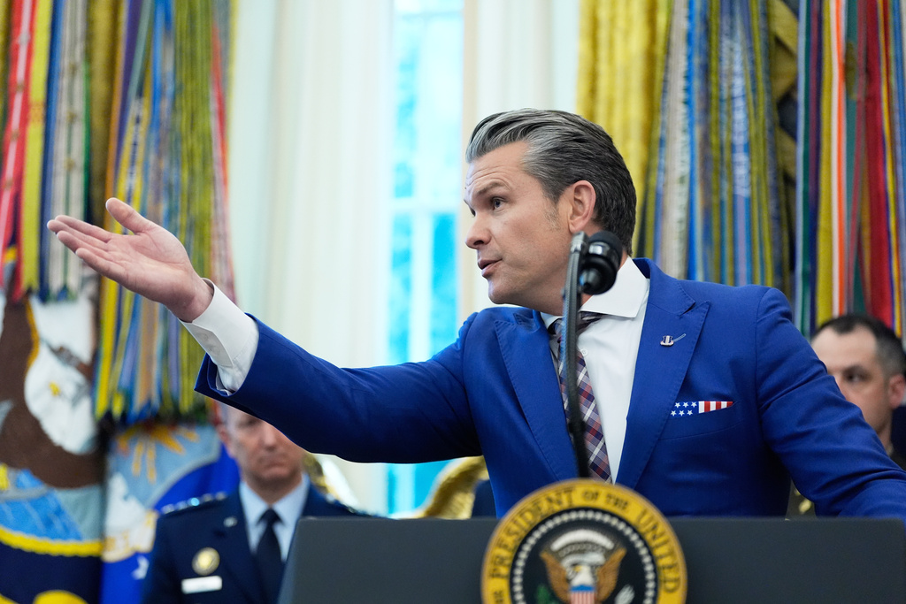 Defense Secretary Pete Hegseth speaks during a Mexican Border Defense Medal presentation in the Oval Office of the White House, Monday, Dec. 15, 2025, in Washington. (AP Photo/Alex Brandon)
