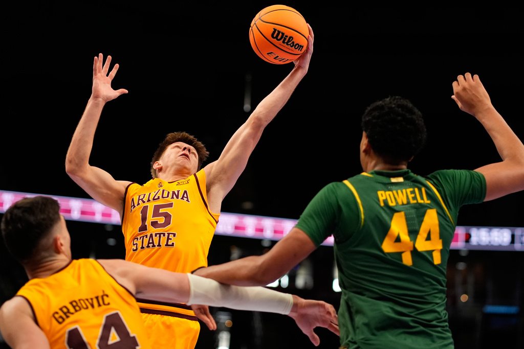 Arizona State guard Noah Meeusen (15) gets a rebound during the first half of an NCAA college basketball game against Baylor against Baylor at the Big 12 Conference tournament Tuesday, March 10, 2026, in Kansas City, Mo. (AP Photo/Charlie Riedel)