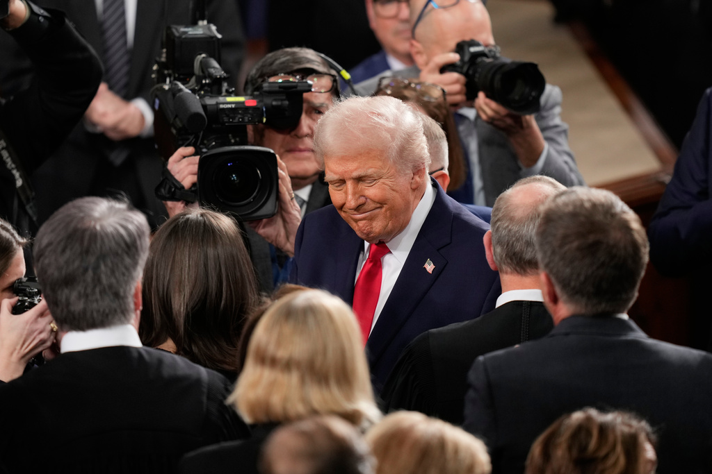 President Donald Trump arrives before delivering the State of the Union address to a joint session of Congress in the House chamber at the U.S. Capitol in Washington, Tuesday, Feb. 24, 2026. (AP Photo/Alex Brandon)