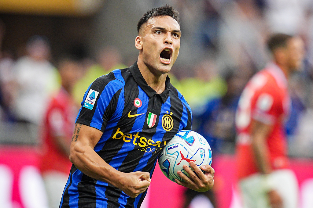 Inter's Lautaro Martinez celebrates after scoring his team's first goal during the Serie A soccer match between Inter and Napoli at the San Siro Stadium in Milan, Italy, Saturday, Sept. 5, 2026. (Marco Alpozzi/LaPresse via AP)