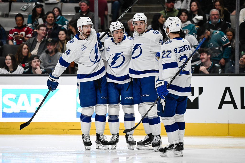 Tampa Bay Lightning center Dominic James (17), middle left, celebrates after scoring a goal against the San Jose Sharks during the second period of an NHL hockey game Saturday, Jan. 3, 2026, in San Jose, Calif. (AP Photo/Thien-An Truong)