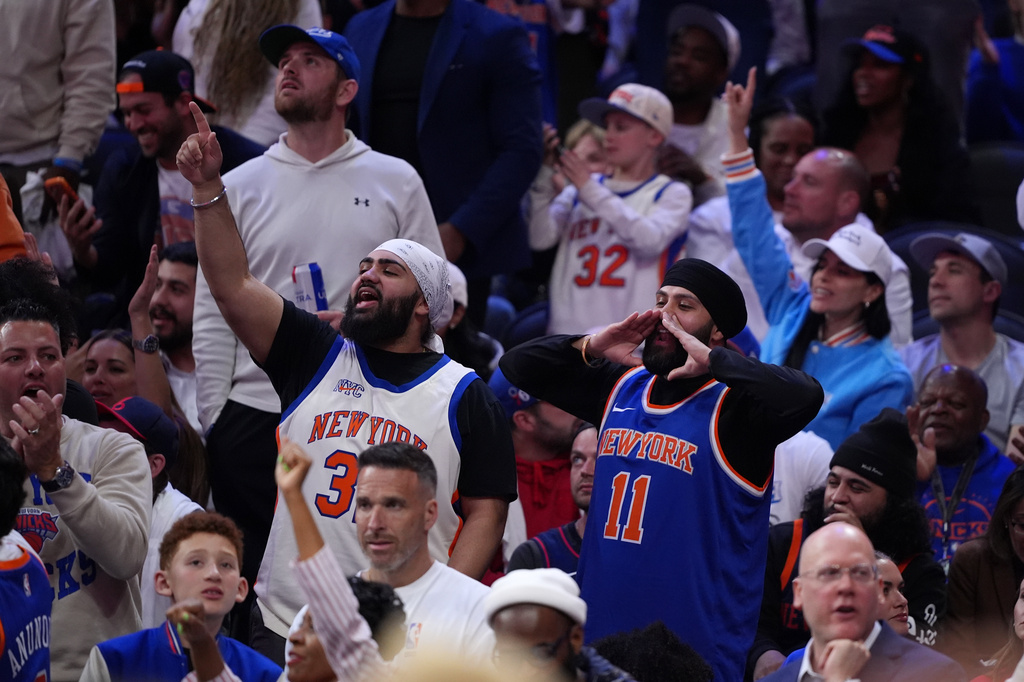 New York Knicks' fan react during the second half of Game 3 in a second-round NBA basketball playoff series against the Philadelphia 76ers Friday, May 8, 2026, in Philadelphia. (AP Photo/Matt Slocum)