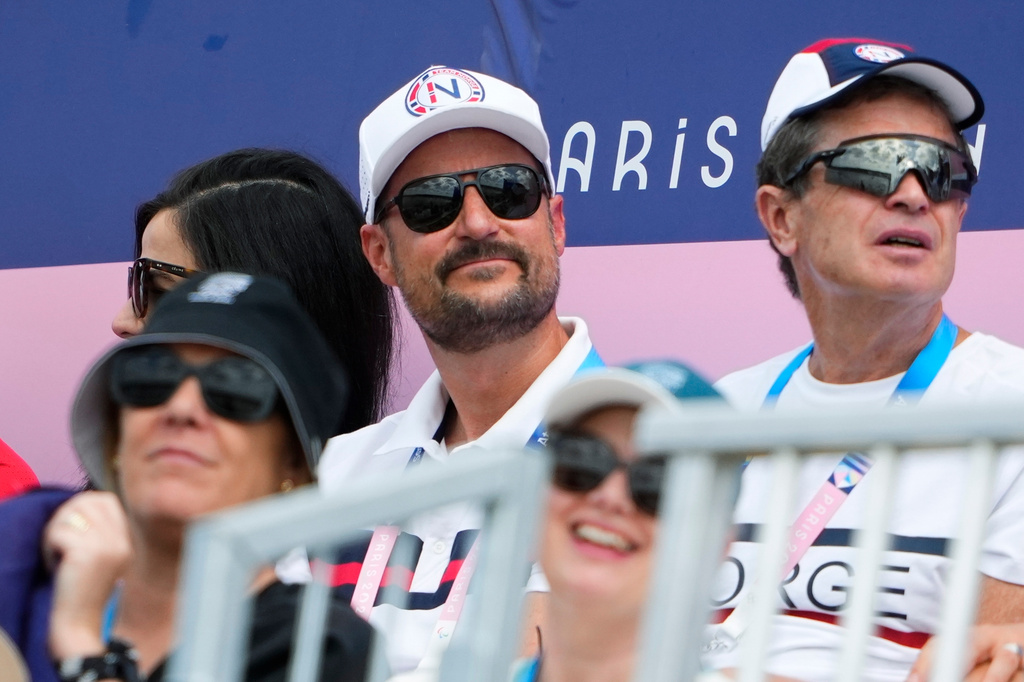 FILE - Norway's Crown Prince Haakon, center, watches canoe sprint competitions at the 2024 Summer Olympics, Thursday, Aug. 8, 2024, in Vaires-sur-Marne, France. (AP Photo/Lindsey Wasson, File)