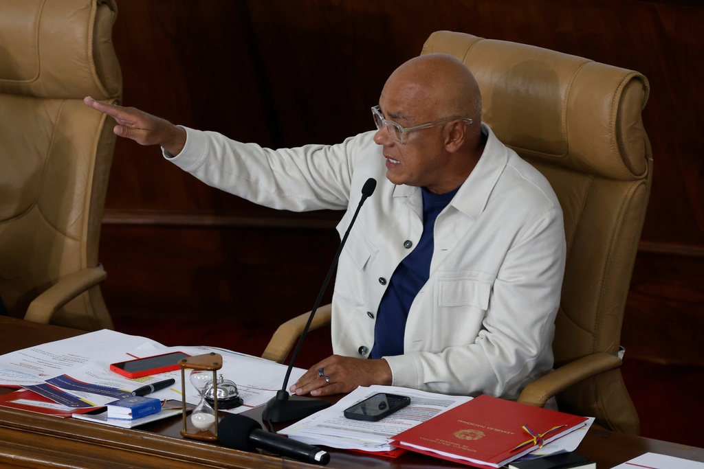 National Assembly President Jorge Rodriguez gestures during a debate on a mining bill at the National Assembly in Caracas, Venezuela, Monday, March 9, 2026. (AP Photo/Pedro Mattey)