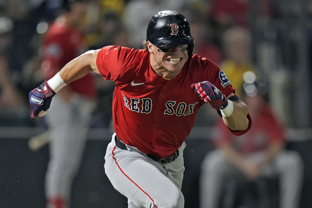 Boston Red Sox's Nate Eaton runs to first base after his single off Tampa Bay Rays pitcher Drew Rasmussen during the second inning of a baseball game Friday, Sept. 19, 2025, in Tampa, Fla. (AP Photo/Chris O'Meara)