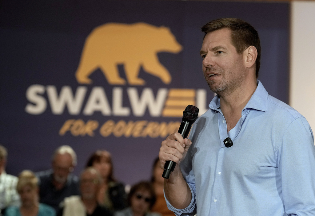 California gubernatorial candidate, Rep. Eric Swalwell, D-Calif., appears at a town hall meeting in Sacramento, Calif., Tuesday, April 7, 2026. (AP Photo/Rich Pedroncelli)