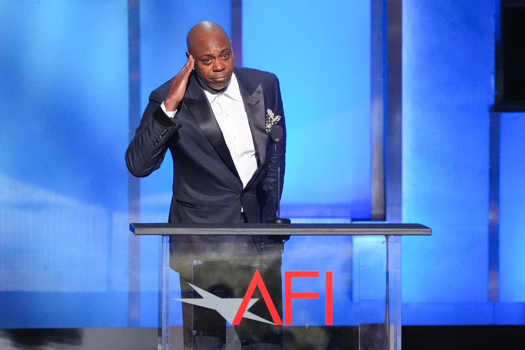 Dave Chappelle speaks during the 51st AFI Life Achievement Award tribute to Eddie Murphy on Saturday, April 18, 2026, at the Dolby Theatre in Los Angeles. (AP Photo/Chris Pizzello)