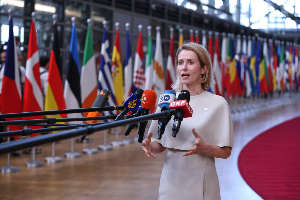 European Union foreign policy chief Kaja Kallas talks to journalists as she arrives for the EU summit in Brussels, Thursday, June 18, 2026. (AP Photo/Omar Havana)