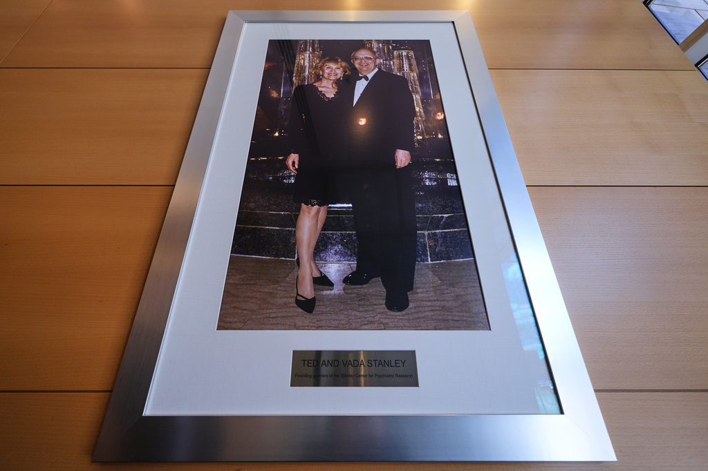 A portrait of Ted and Vada Stanley hangs in the lobby of the Broad Institute, which houses the Stanley Center for Psychiatric Research, Tuesday, March 17, 2026, in Cambridge, Mass. (AP Photo/Charles Krupa)