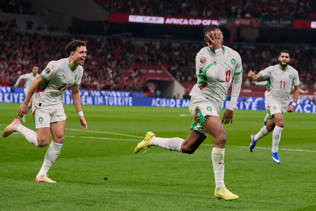 Morocco's Ayoub El Kaabi celebrates after scoring his side's first goal during the Africa Cup of Nations group A soccer match between Zambia and Morocco in Rabat, Morocco, Monday, Dec. 29, 2025. (AP Photo/Themba Hadebe)