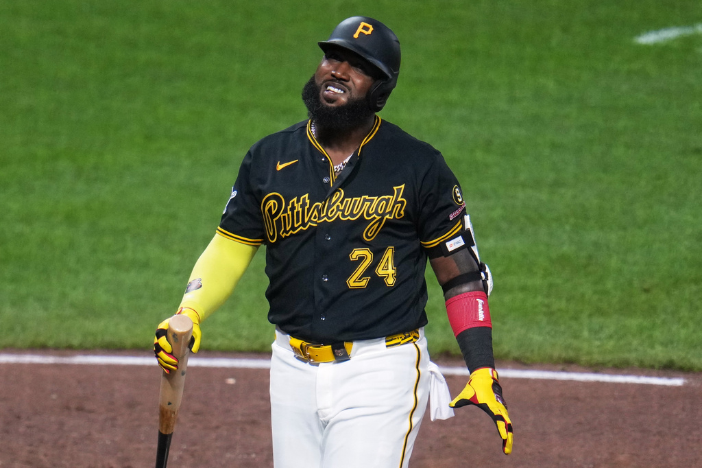 Pittsburgh Pirates' Marcell Ozuna collects himself after fouling off a pitch from Atlanta Braves pitcher Raisel Iglesias during the ninth inning of a baseball game in Pittsburgh, Wednesday, July 8, 2026. (AP Photo/Gene J. Puskar)