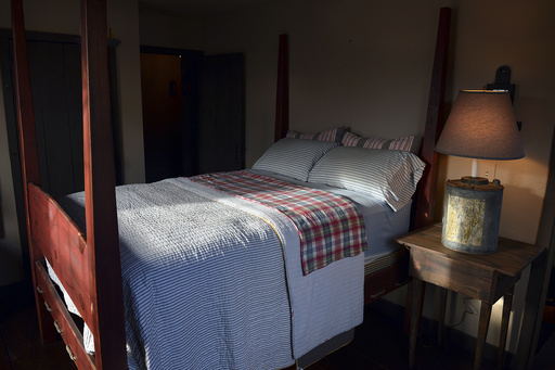 FILE - A shaft of light shines into a bedroom in Belle, W.Va., on Nov. 11, 2013. (Craig Cunningham/The Daily Mail via AP, File) FILE - A shaft of light shines into a bedroom in Belle, W.Va., on Nov. 11, 2013. (Craig Cunningham/The Daily Mail via AP, File)