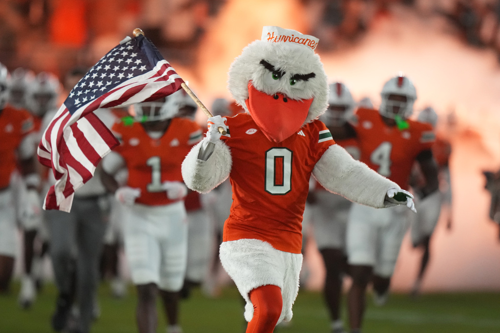 The Miami mascot Sebastian the Ibis runs onto the field before an NCAA college football game against Florida A&M, Thursday, Sept. 10, 2026, in Miami Gardens, Fla. (AP Photo/Lynne Sladky)