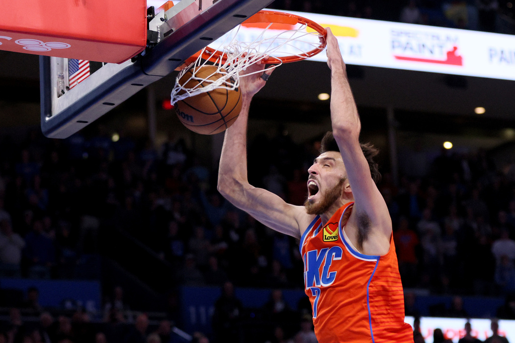 Oklahoma City Thunder center Chet Holmgren dunks during the second half of an NBA basketball game against the Atlanta Hawks, Monday, Dec. 29, 2025, in Oklahoma City. (AP Photo/Nate Billings)