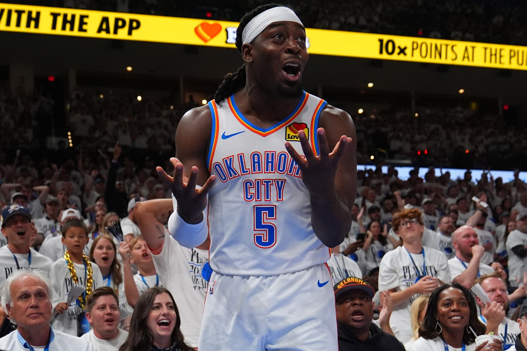 Oklahoma City Thunder guard Luguentz Dort (5) reacts to a foul in the second half of Game 5 in the Western Conference finals NBA basketball playoffs series against the San Antonio Spurs, Tuesday, May 26, 2026, in Oklahoma City. (AP Photo/Julio Cortez)