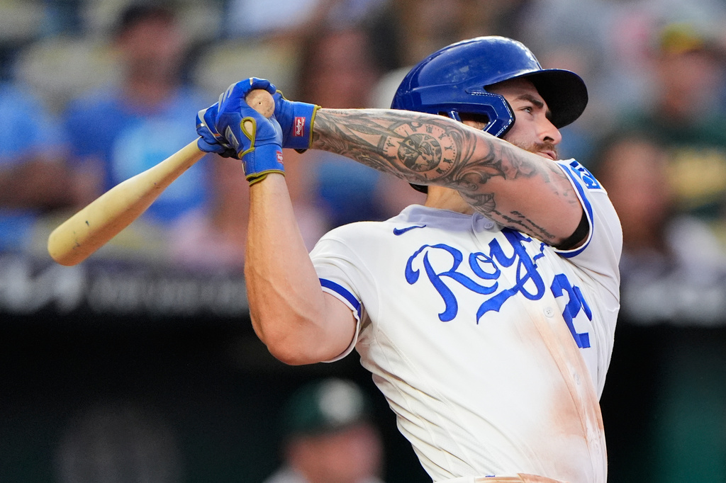 Kansas City Royals' Kyle Isbel watches his RBI single during the third inning of a baseball game against the Athletics, Monday, Aug. 17, 2026, in Kansas City, Mo. (AP Photo/Charlie Riedel)