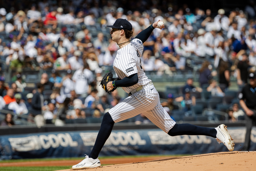 New York Yankees Cam Schlittler throws during the first inning of a baseball game against the New York Mets, Sunday, Sept. 13, 2026, in New York. (AP Photo/Angelina Katsanis)