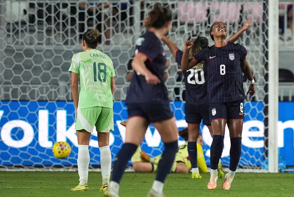 United States midfielder Jaedyn Shaw (8) celebrates after scoring her side's second goal against Italy during the first half of an international friendly soccer match, Monday, Dec. 1, 2025, in Fort Lauderdale, Fla. (AP Photo/Rebecca Blackwell)