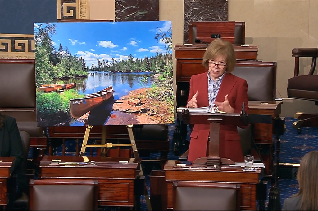 In this image from Senate Television video, Sen. Tina Smith, D-Minn., speaks about the Boundary Waters in northern Minnesota, on the Senate floor at the U.S. Capitol in Washington, Wednesday, April 15, 2026. (Senate Television via AP)