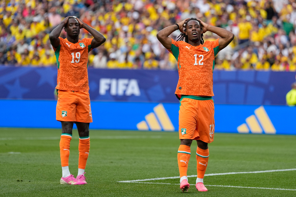 Ivory Coast's Elye Wahi, right, and teammate Nicolas Pepe react after missing a chance to score against Ecuador during a World Cup Group E soccer match in Philadelphia, Sunday, June 14, 2026. (AP Photo/Matt Slocum)