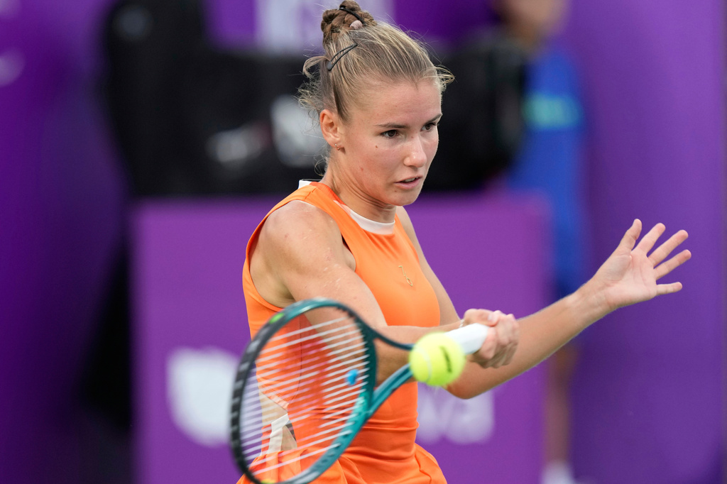FILE -Tatiana Prozorova of Russia returns a shot to Barbora Krejcikova of the Czech Republic during the first round match of the Korea Open tennis championships at Seoul Olympic Park Tennis Center in Seoul, South Korea, Sept. 16, 2025. (AP Photo/Ahn Young-joon, File)