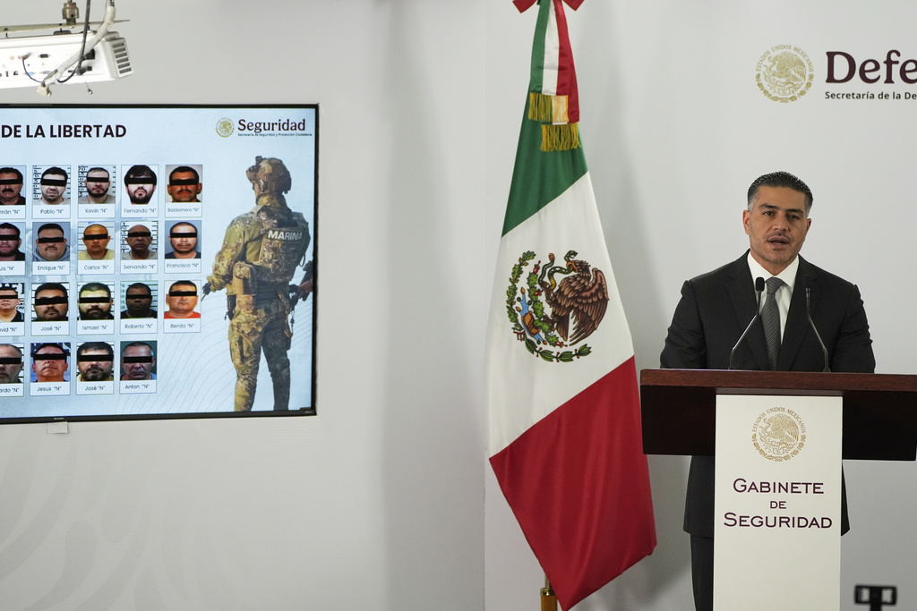 Mexican Security and Citizen Protection Minister Omar Garcia Harfuch gives a news conference about Mexico having sent 29 Mexican drug cartel figures to the U.S., in Mexico City, Wednesday, Aug. 13, 2025. (AP Photo/Fernando Llano)