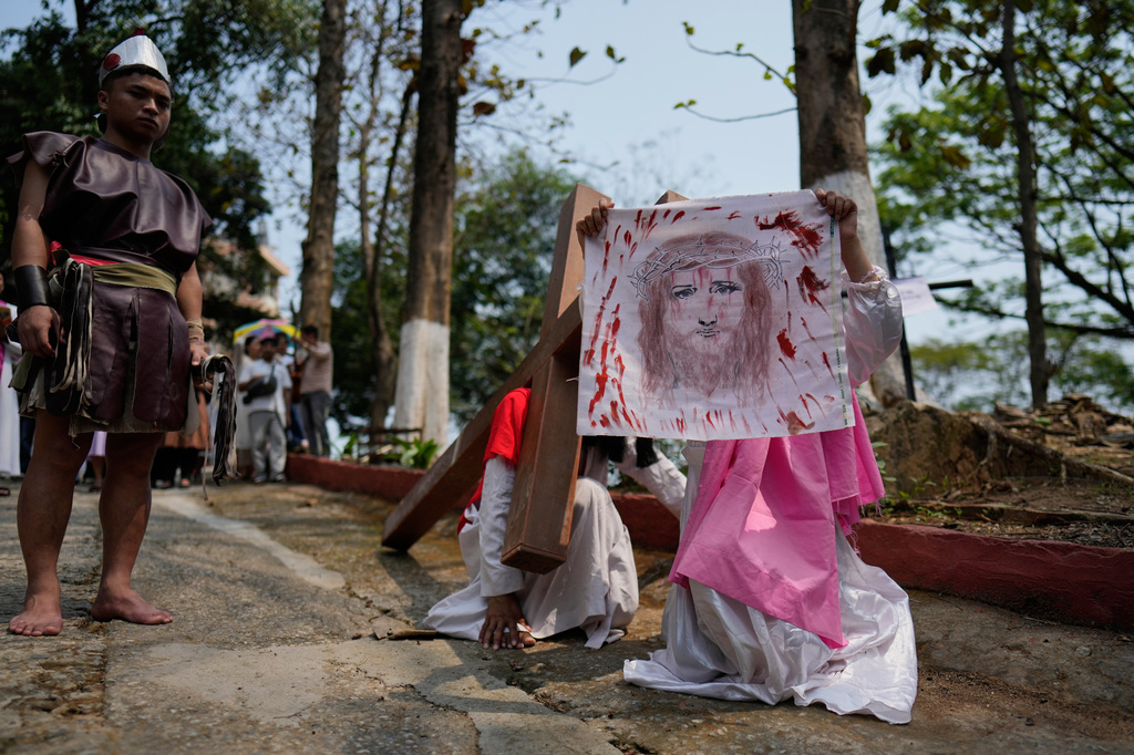 Christians reenact the crucifixion of Jesus Christ in Guwahati, India, on Good Friday, April 3, 2026. (AP Photo/Anupam Nath)