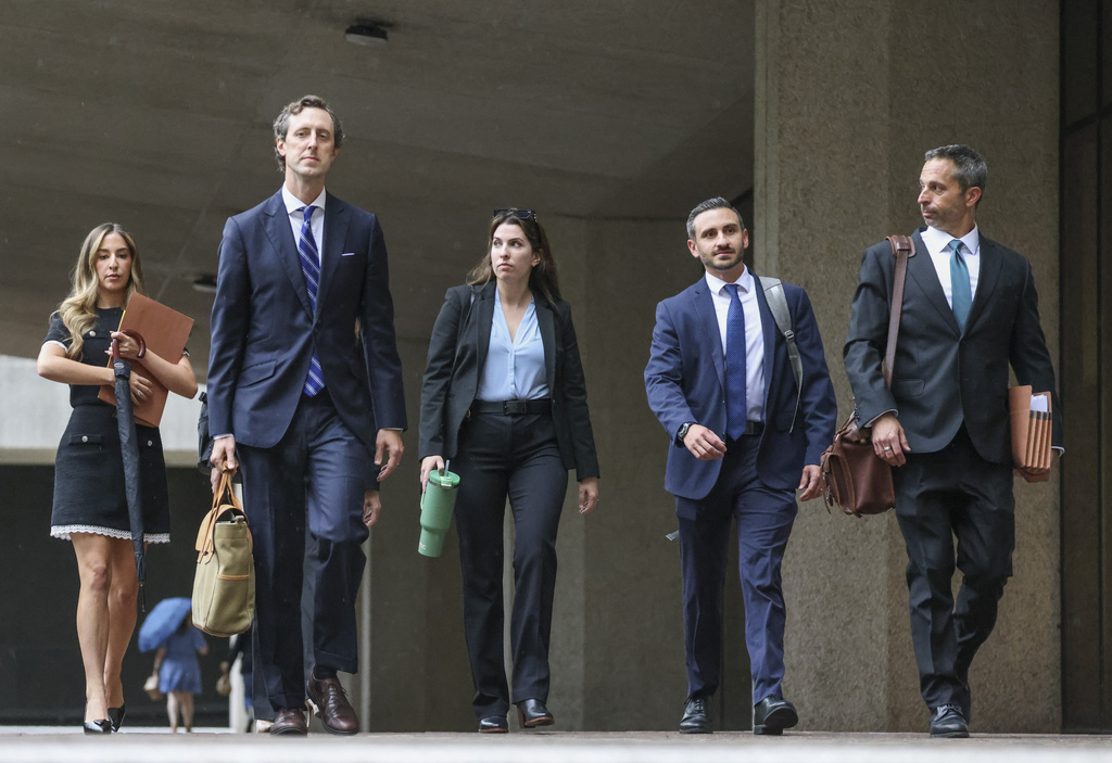 United States attorneys leaves the Hale Boggs Federal Building-Courthouse after the indictment of Mayor LaToya Cantrell in New Orleans, Friday, Aug. 15, 2025. (Sophia Germer /The Times-Picayune/The New Orleans Advocate via AP)