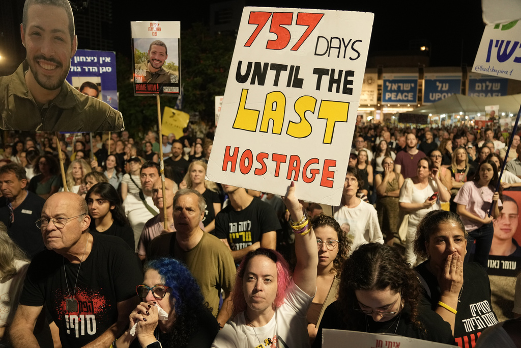 Relatives and supporters of hostages held by Hamas in the Gaza Strip attend a rally calling for their immediate release in Tel Aviv, Israel, Saturday, Nov. 1, 2025. (AP Photo/Mahmoud Illean)