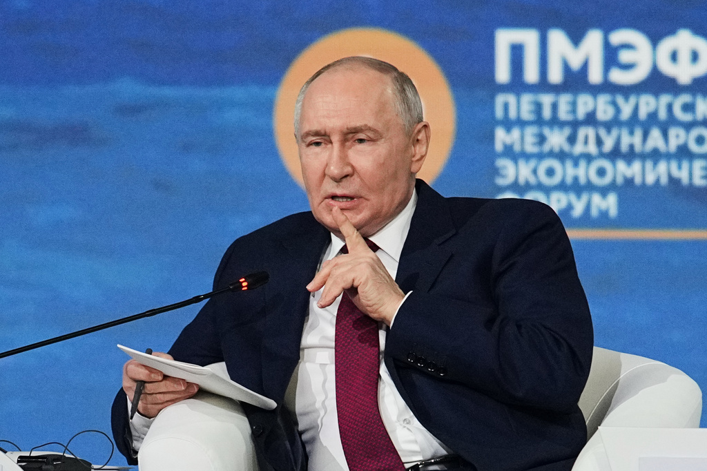 Russian President Vladimir Putin gestures speaking at a plenary session at the St. Petersburg International Economic Forum in St. Petersburg, Russia, on Friday, June 5, 2026. (AP Photo/Dmitri Lovetsky)