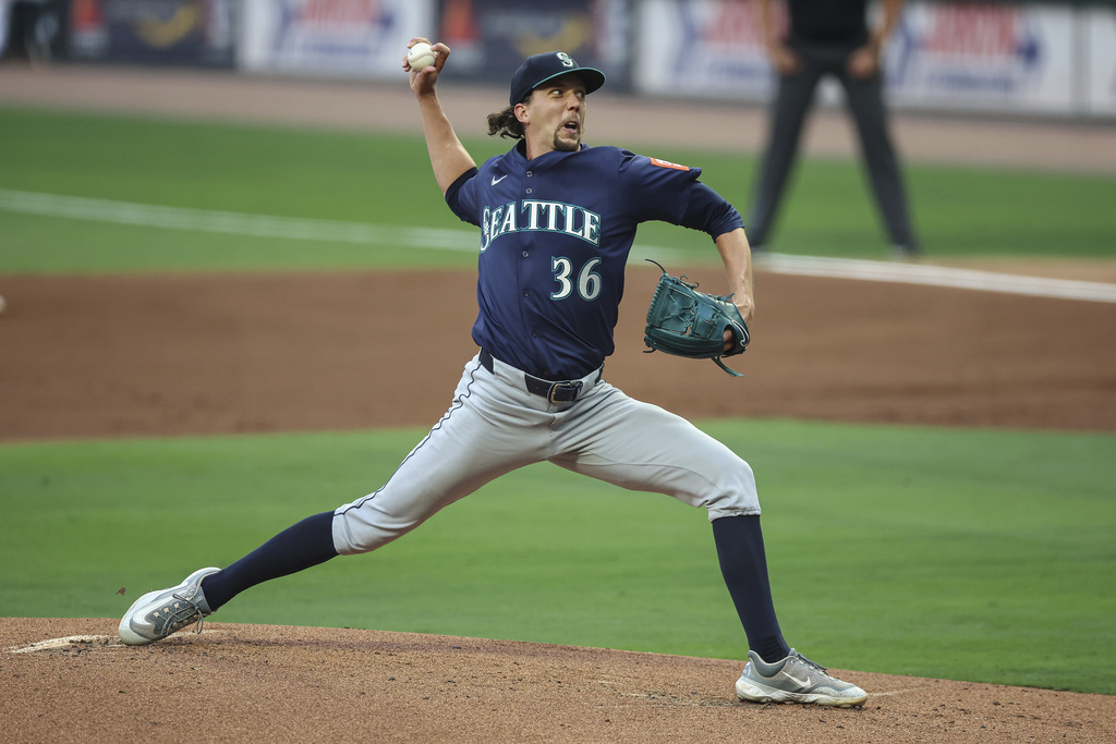 Seattle Mariners pitcher Logan Gilbert delivers in the first inning of a baseball game against the Atlanta Braves, Friday, Sept. 5, 2025, in Atlanta. (AP Photo/Colin Hubbard)