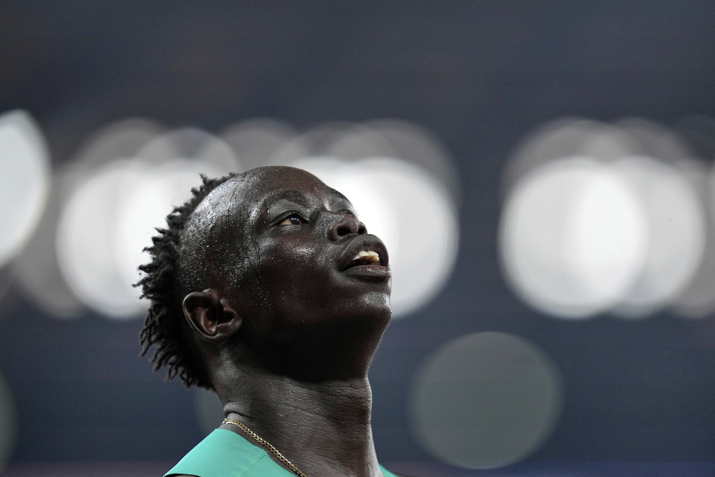 Australia's Gout Gout finishes a men's 200 meters heat at the World Athletics Championships in Tokyo, Wednesday, Sept. 17, 2025. (AP Photo/Petr David Josek)