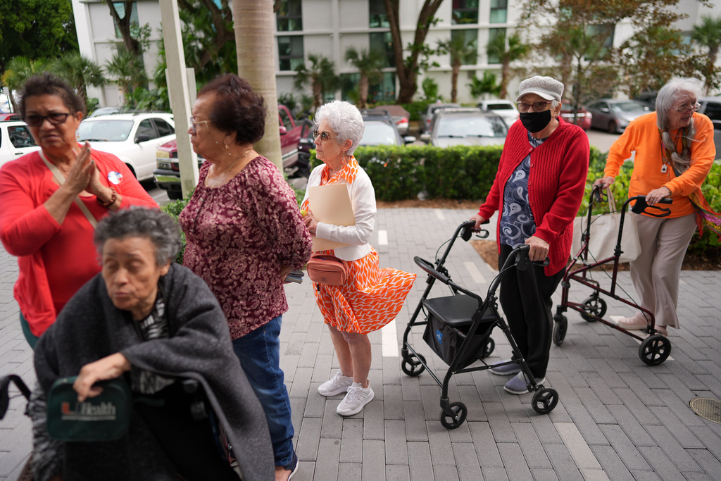 Seniors stand in line to vote at a polling place in Miami's Little Havana neighborhood, on Election Day, Tuesday, Nov. 4, 2025. (AP Photo/Rebecca Blackwell)