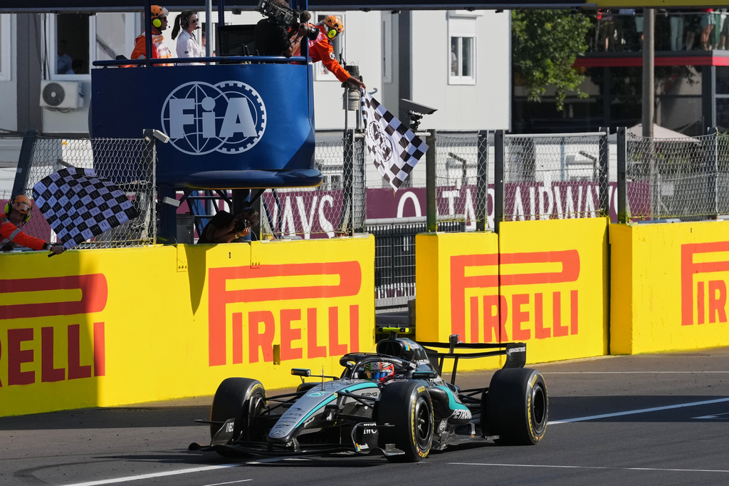 Mercedes driver Andrea Kimi Antonelli of Italy crosses the finish line to win the Italian Formula One Grand Prix race, in Monza, Italy, Sunday, Sept. 6, 2026. (AP Photo/Antonio Calanni)