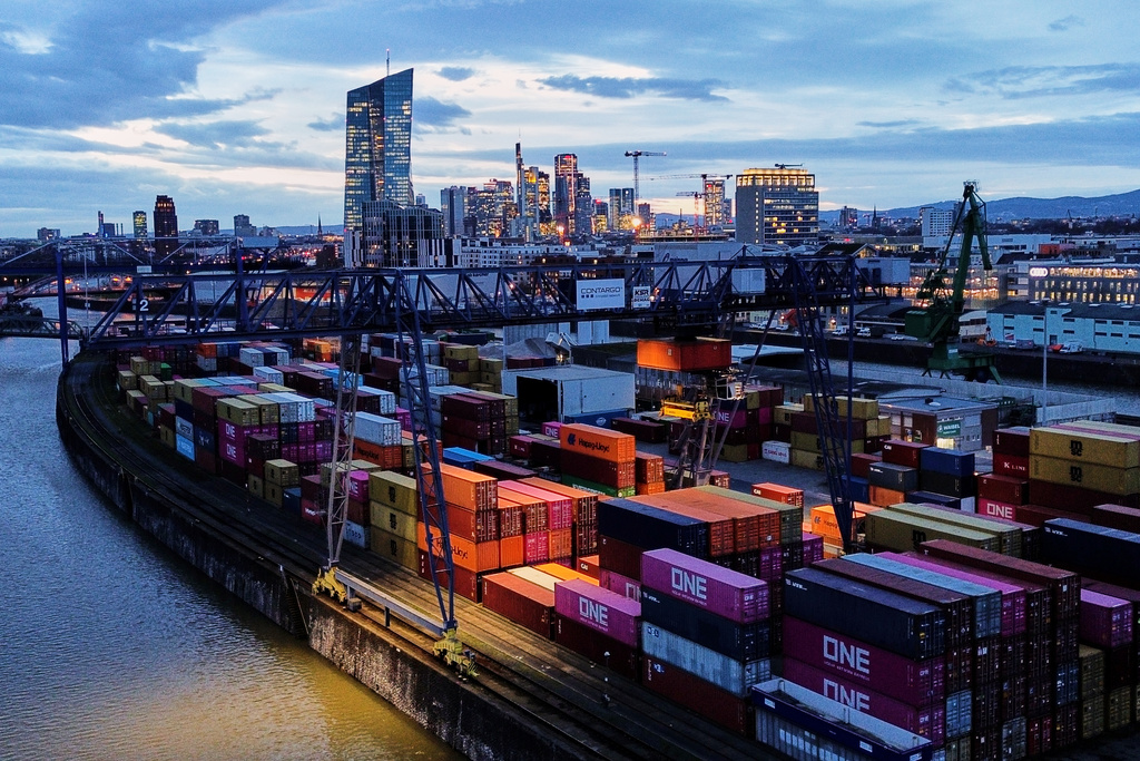 Containers are stored in a cargo terminal in Frankfurt, Germany, Monday, Feb. 23, 2026. (AP Photo/Michael Probst)