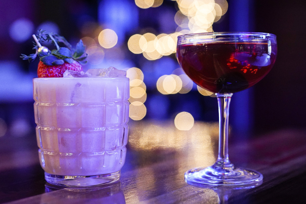FILE - Mixed drinks are displayed at a bar in Baltimore, Feb. 8, 2023. (AP Photo/Julio Cortez, File)