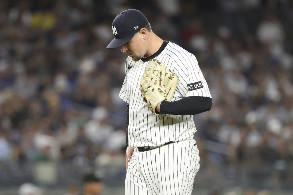 New York Yankees pitcher Mark Leiter Jr. stands on the field during the seventh inning of a baseball game against the Boston Red Sox, Friday, Aug. 22, 2025, in New York. (AP Photo/Pamela Smith)