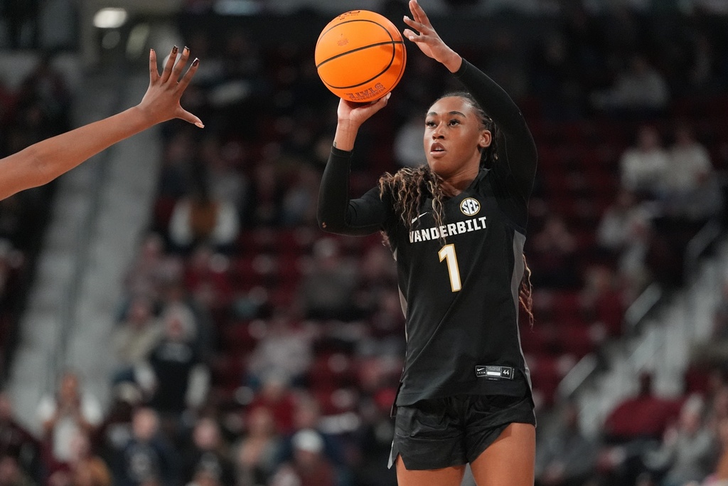 Vanderbilt guard Mikayla Blakes (1) shoots a 3-point shot during the first half of an NCAA college basketball game against Mississippi State, Thursday, Jan. 15, 2026, in Starkville, Miss. (AP Photo/Rogelio V. Solis)