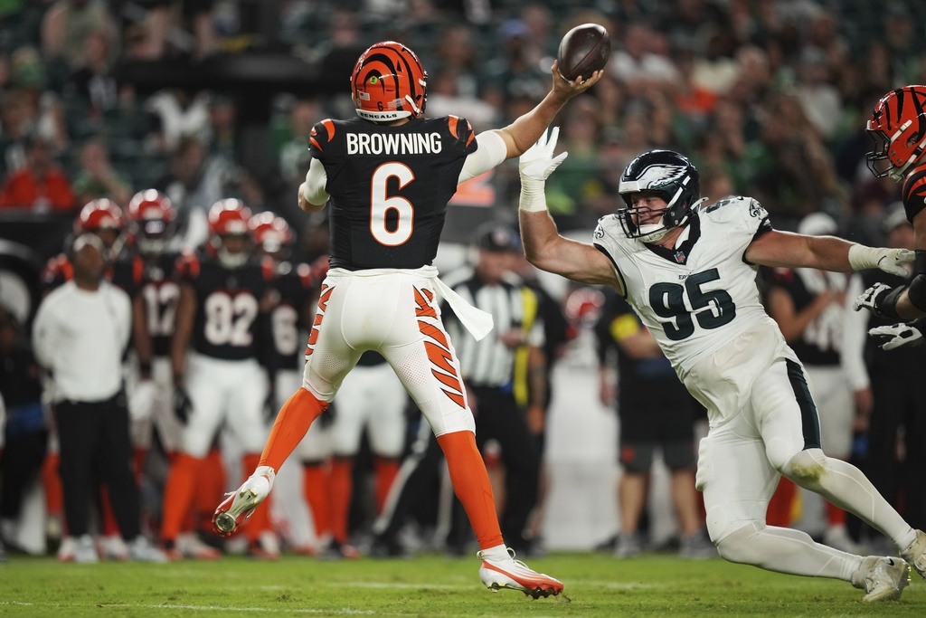 Philadelphia Eagles defensive tackle Ty Robinson (95) pressures Cincinnati Bengals quarterback Jake Browning (6) during the second half of an NFL preseason football game Thursday, Aug. 7, 2025, in Philadelphia. (AP Photo/Matt Slocum)