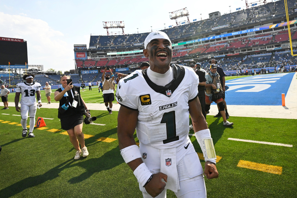 Philadelphia Eagles quarterback Jalen Hurts walks off the field after an NFL football game against the Tennessee Titans, Sunday, Sept. 20, 2026, in Nashville, Tenn.(AP Photo/John Amis)
