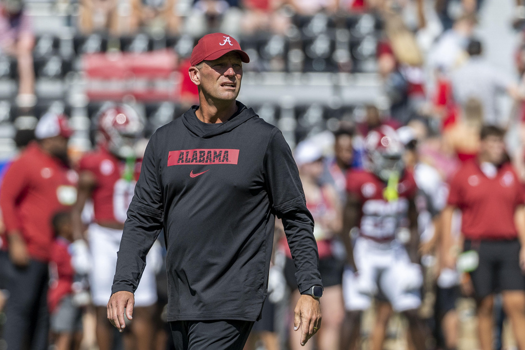 Alabama head coach Kalen DeBoer walks the field during warmups before an NCAA college football game against Wisconsin, Saturday, Sept. 13, 2025, in Tuscaloosa, Ala. (AP Photo/Vasha Hunt)